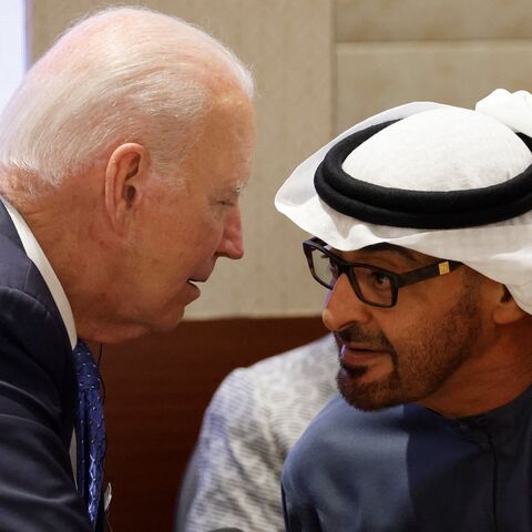 UAE's president, Sheikh Mohamed bin Zayed al-Nahyan (L), speaks with US President Joe Biden as they attend a session of the G20 Leaders' Summit at the Bharat Mandapam in New Delhi on September 9, 2023.